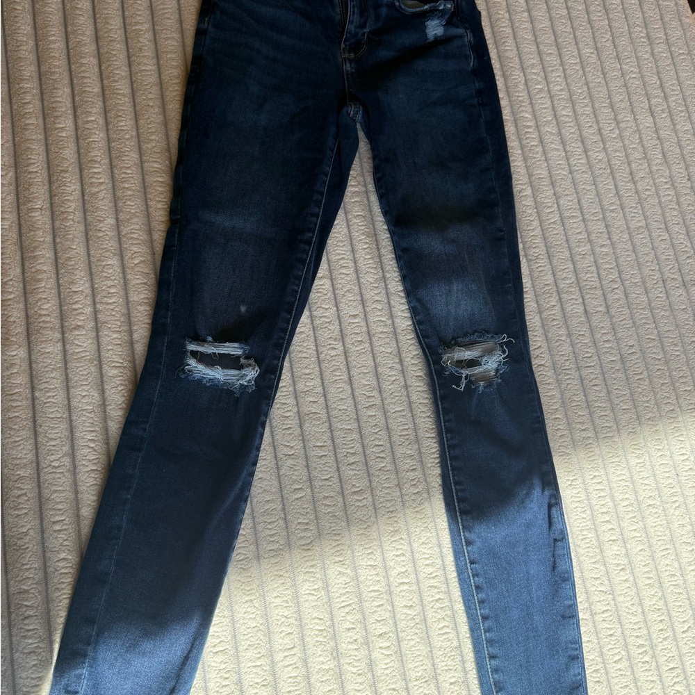 Women's Distressed Blue Jeans